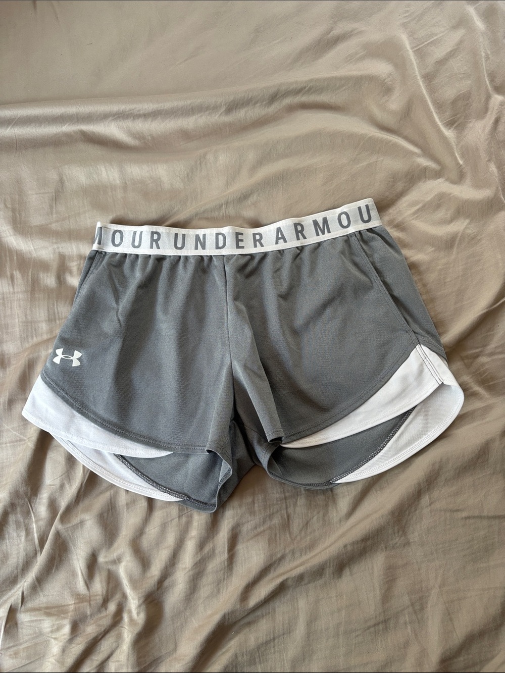 Under Armour Women's Gray Athletic Shorts with White Waistband and Trim